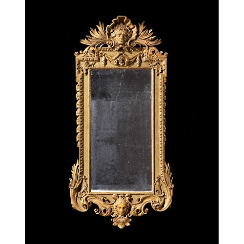 A rare George II giltwood architectural mirror
